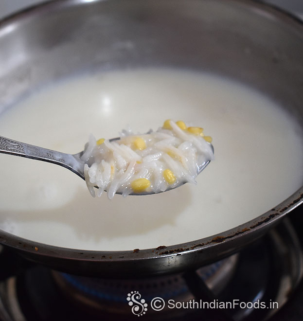Heat milk and water, add moong dal and rice