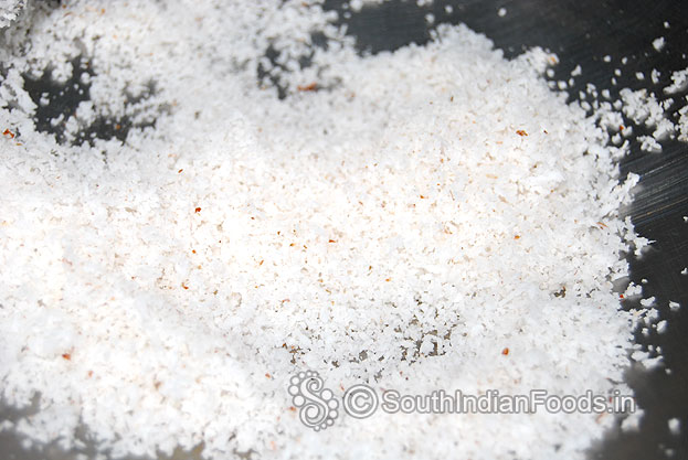 Heat pan add coconut & roast for 2 min