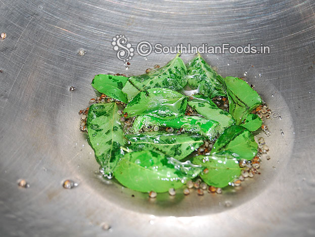 Heat coconut oil in a pan, add mustard, curry leaves & green chilli saute