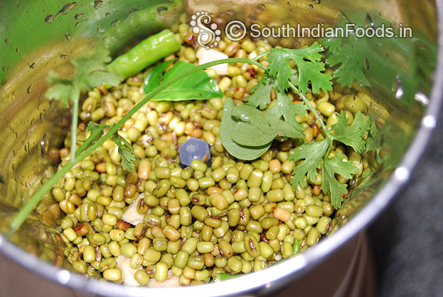 Put pesarattu ingredients in a mixer jar & coarsely with enough water