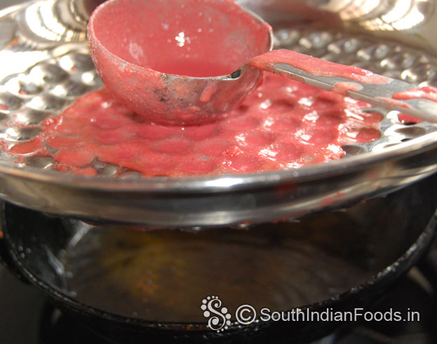 Heat oil hold bbondi ladle over the pan, pour beet gram flour batter shake & deep fry
