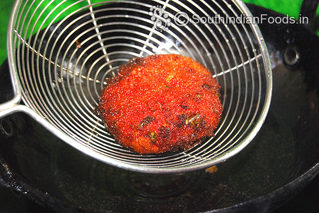 Once its ready, remove from oil, drain on absorbent paper