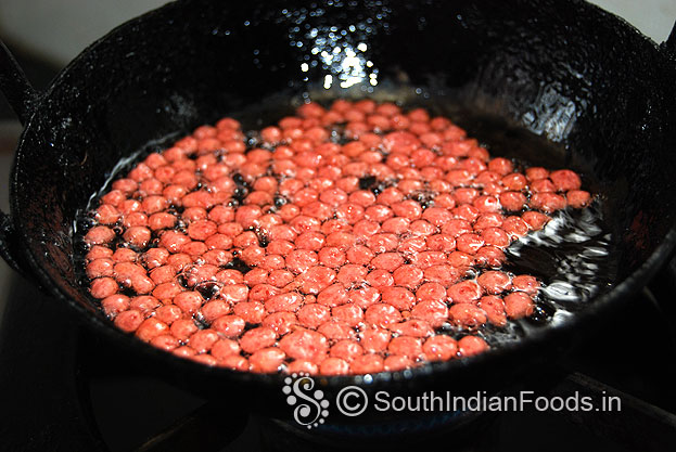 Deep fry beet boondis till crisp on medium flame