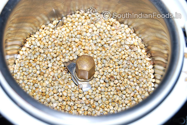 In a mixie jar add dry roasted kambu then coarsely grind