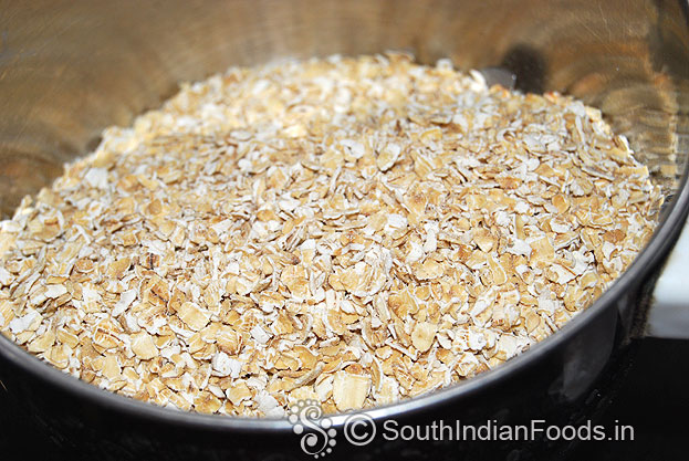 Add roasted oats in mixie jar, finely grind
