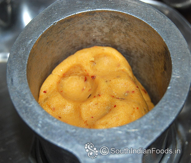 Fill murukku kuzhal with peanut murukku dough
