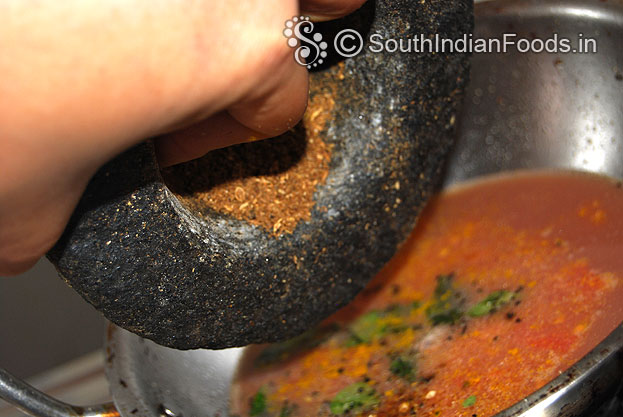 Add freshly ground rasam powder