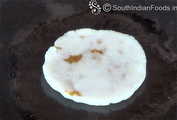 Heat iron dosa tawa, pour 1 tbsp oil, cook both side