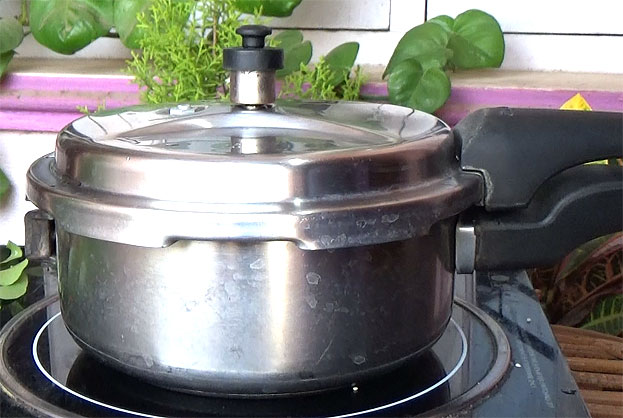 Cover lid, cook for 3 whistles