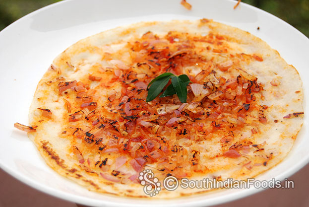 Spicy schezwan onion dosai