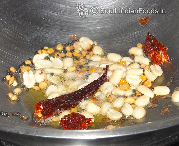 Heat sesame oil add mustard, chana dal, urad dal, peanuts, dry red chilli