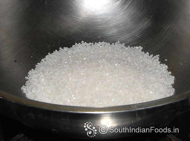 Heat pan, add sugar