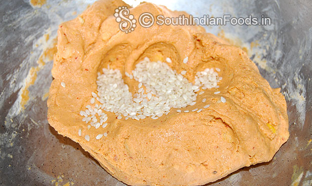Add white sesame seeds & oil mix well