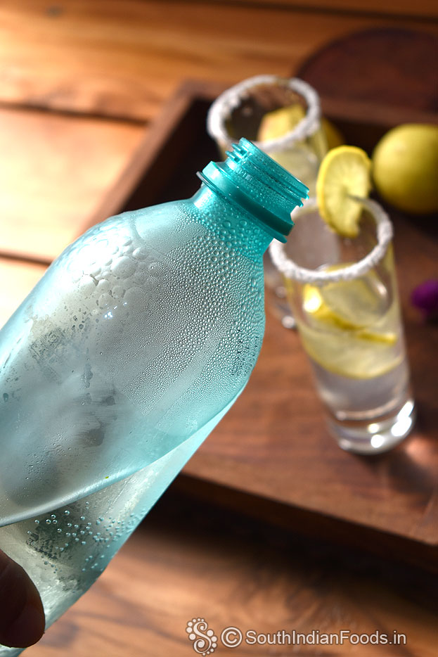 Add lemon juice, soda, & lemon slices