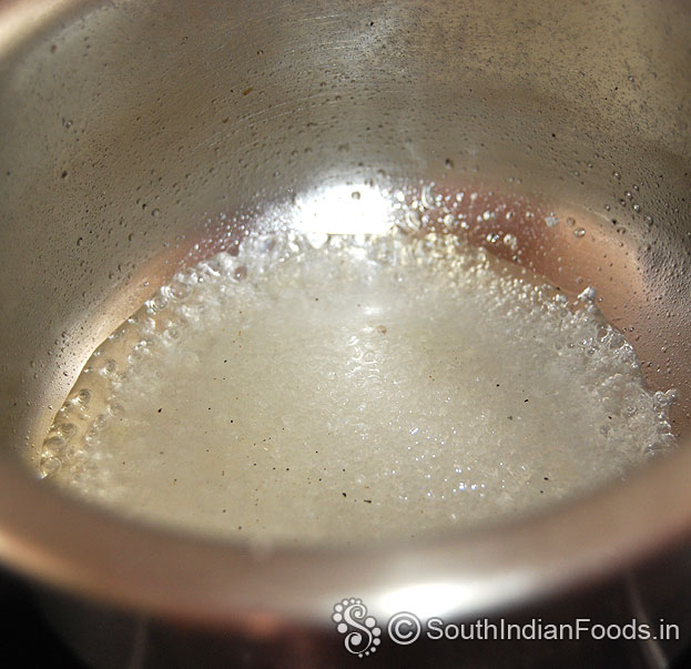 Heat sugar and water, let it melt