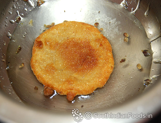 Dip malpua in sugar syrup