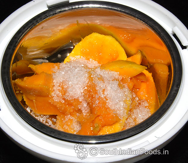 Grind mango & sugar