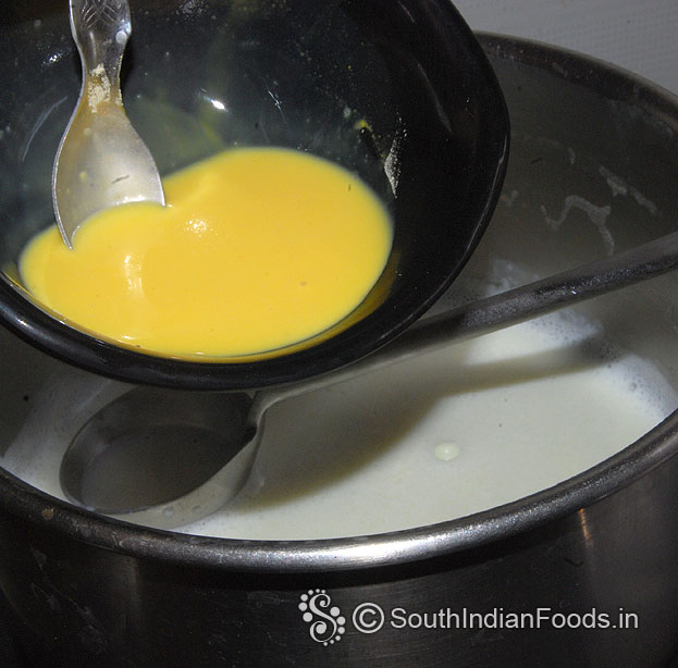 Reduce flame to low add custard mixture mix well without lumps