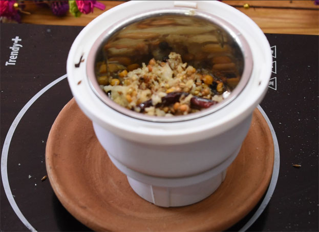Put it in a mixer jar, grind to fine paste