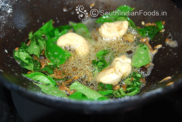 Heat ghee in a pan, add seasoning ingredients, cumin, peppercorns, green chilli, ginger, cashew nuts, curry leaves