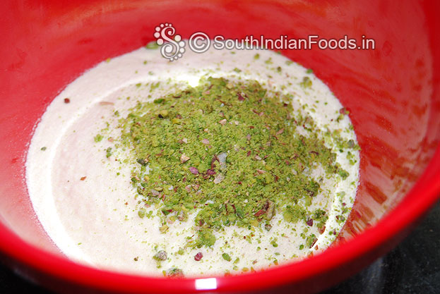 Add ground pistachios