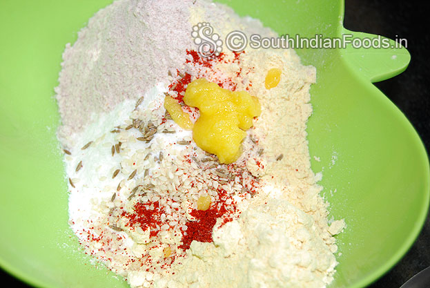 Add ghee mix well then add warm water, knead it & make soft dough
