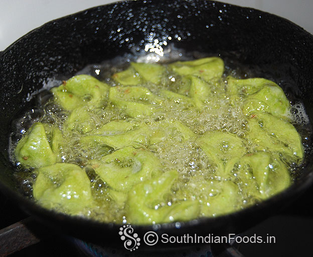 Heat oil in a pan, add raw kormolas