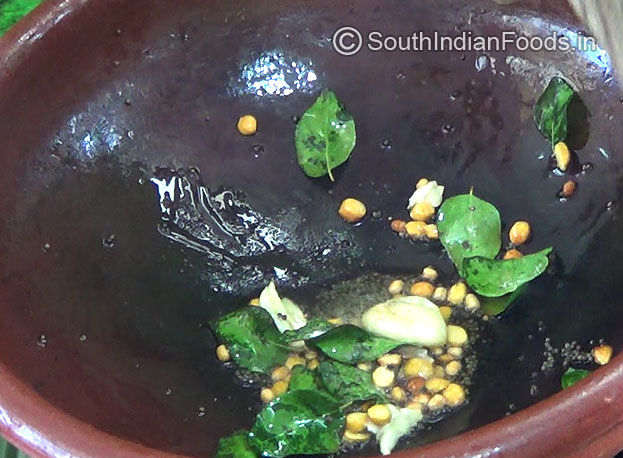 Add Garlic, Asafetida & Curry leaves