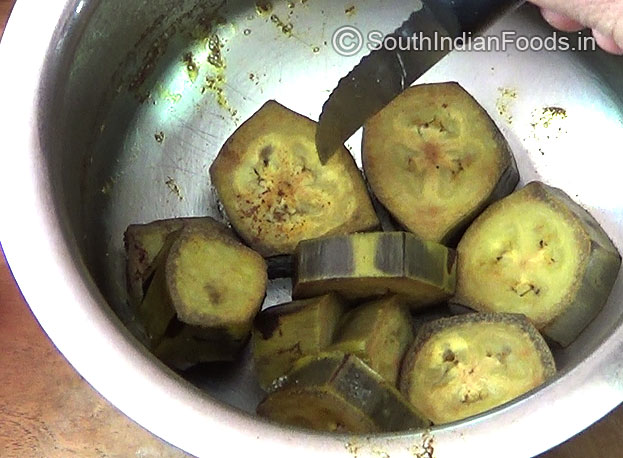 Peel off the raw banana skin