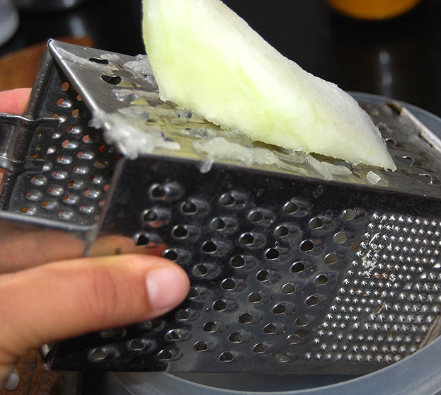 Peel off the hard skin, grate
